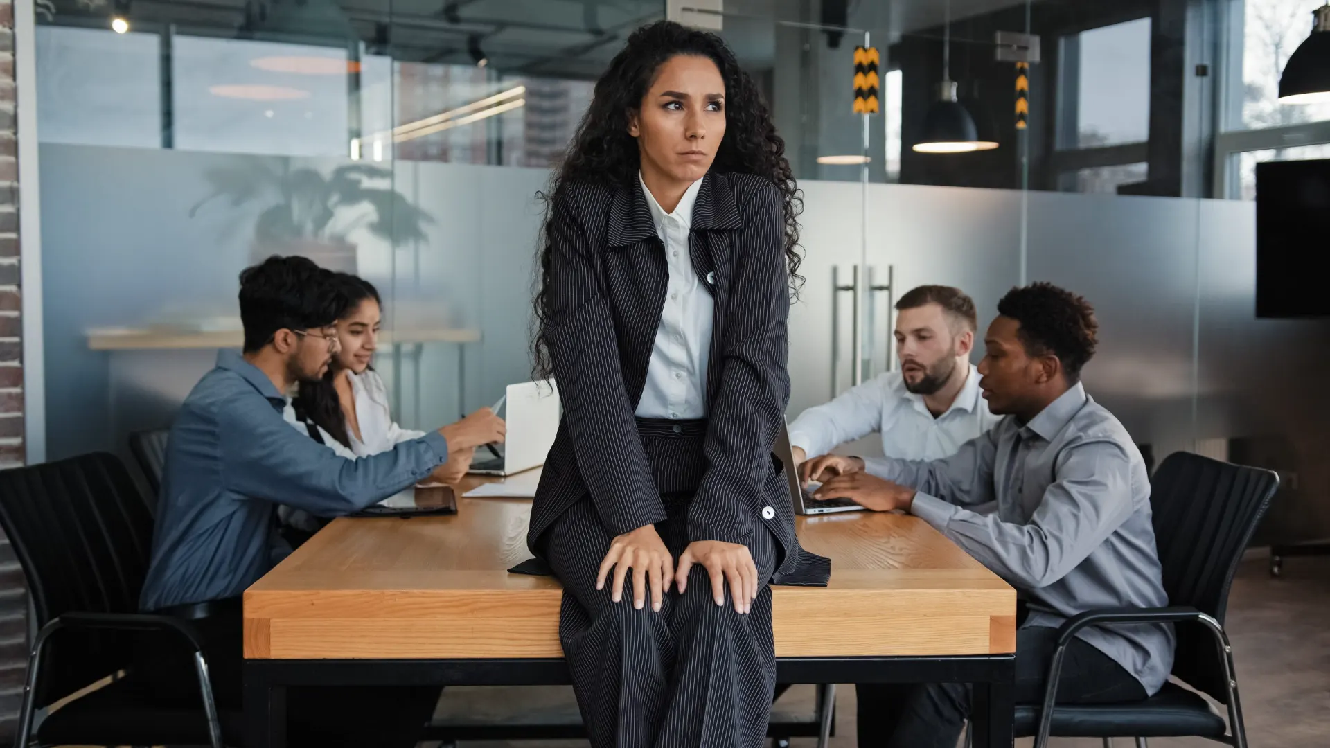 Business leader looking concerned at a conference table